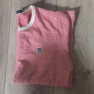 red and white striped obey tee